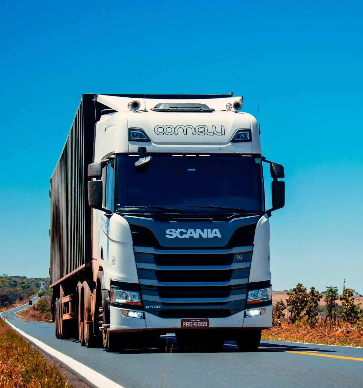 white truck on road during daytime